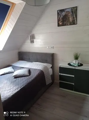 Łóżko lub łóżka w pokoju w obiekcie Całoroczny Ośrodek Wypoczynkowy COMFORT HOUSE