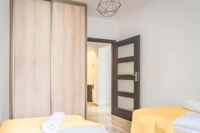 Łóżko lub łóżka w pokoju w obiekcie Wysokie Himalaje, MyWeek