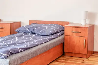 Łóżko lub łóżka w pokoju w obiekcie Ośrodek Szkoleniowo - Noclegowy Chojnik