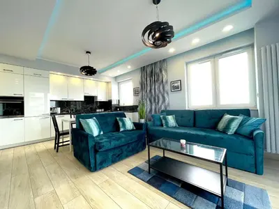 Część wypoczynkowa w obiekcie Apartament z tarasem i widokiem na Odrę