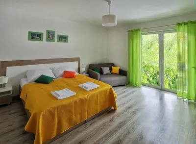 Łóżko lub łóżka w pokoju w obiekcie Pensjonat Na Każdą Porę