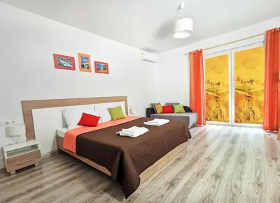 Łóżko lub łóżka w pokoju w obiekcie Pensjonat Na Każdą Porę