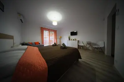 Łóżko lub łóżka w pokoju w obiekcie Pensjonat Na Każdą Porę