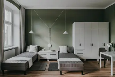 Łóżko lub łóżka w pokoju w obiekcie Klimatyczny Apartament - Małachowskiego 18 FREE PARKING