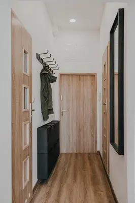 Telewizja i/lub zestaw kina domowego w obiekcie Klimatyczny Apartament - Małachowskiego 18 FREE PARKING