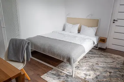 Łóżko lub łóżka w pokoju w obiekcie Apartament AUGUSTYN