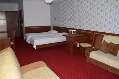 Łóżko lub łóżka w pokoju w obiekcie Górska Dolina