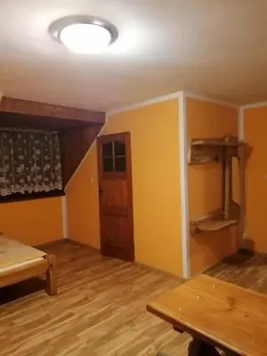 Łóżko lub łóżka w pokoju w obiekcie Pokoje Gościnne Alexandra