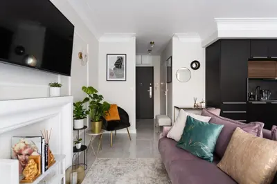 Telewizja i/lub zestaw kina domowego w obiekcie Golden Prince Apartment, so close to Rynek! Free parking included.