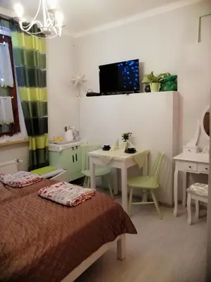 Łóżko lub łóżka w pokoju w obiekcie DOMEK Zielona Oaza