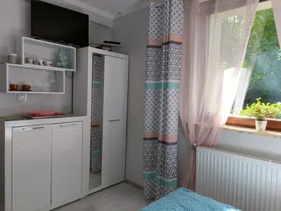 Kuchnia lub aneks kuchenny w obiekcie DOMEK Zielona Oaza