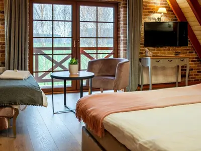 Łóżko lub łóżka w pokoju w obiekcie Helenówka AGRO & SPA