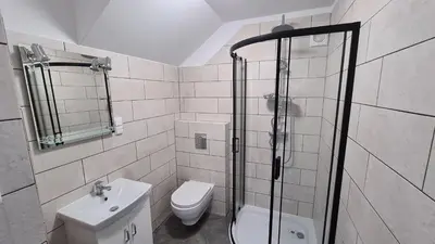 Łazienka w obiekcie Urocze Apartamenty na Wsi