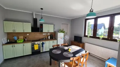 Kuchnia lub aneks kuchenny w obiekcie Urocze Apartamenty na Wsi