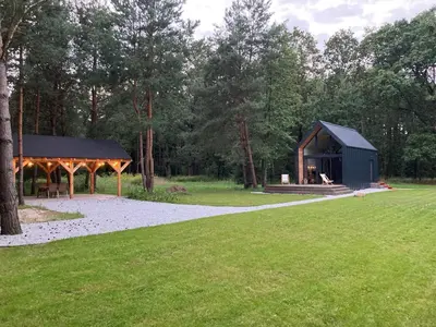 Ogród w obiekcie Domek Quatro Brzezinki