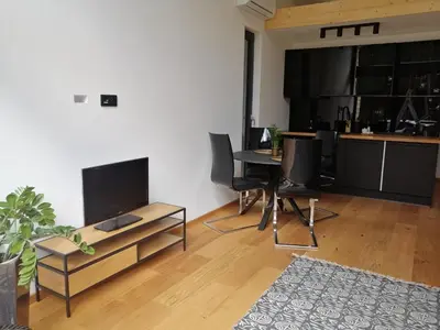 Telewizja i/lub zestaw kina domowego w obiekcie Domek Quatro Brzezinki
