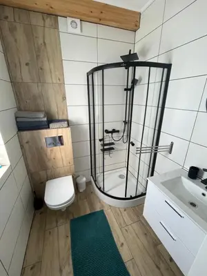 Łazienka w obiekcie Domek nad Stawem