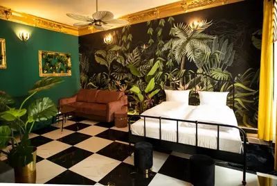 Łóżko lub łóżka w pokoju w obiekcie Jungle Apartments