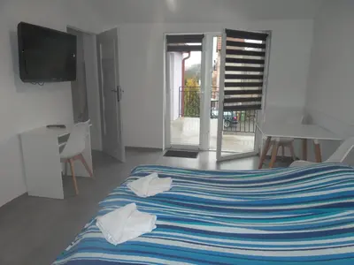 Łóżko lub łóżka w pokoju w obiekcie Gościniec Solan