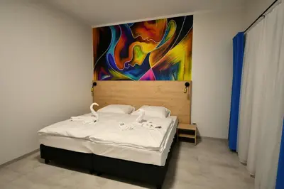 Łóżko lub łóżka w pokoju w obiekcie Za Bunkrem 2 0