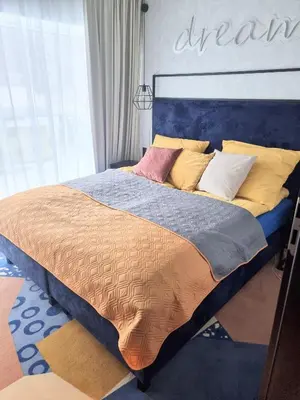Łóżko lub łóżka w pokoju w obiekcie Apartament Złota Perła Czarna Góra