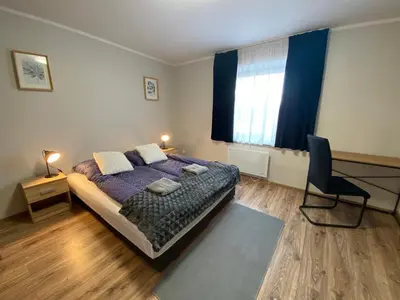 Łóżko lub łóżka w pokoju w obiekcie Hotelik Nad Zalewem 10 km od Legnicy