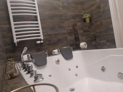 Łazienka w obiekcie Apartamenty LENA 5 Jacuzzi