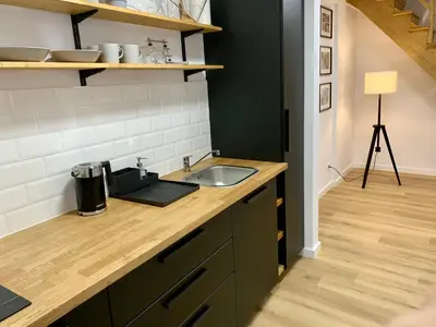 Kuchnia lub aneks kuchenny w obiekcie Apartament PIĘTROWY 55m w samym centrum miasta z DARMOWYM parkingiem VII
