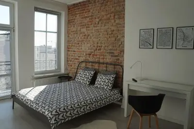 Łóżko lub łóżka w pokoju w obiekcie Apartament Gliwice Centrum Witkiewicza II