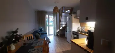 Kuchnia lub aneks kuchenny w obiekcie Apartament Hortensjowy Zakątek