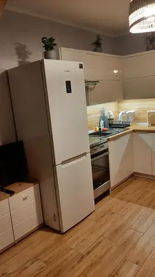 Kuchnia lub aneks kuchenny w obiekcie Apartament Hortensjowy Zakątek