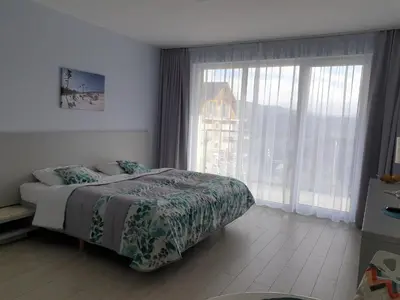 Łóżko lub łóżka w pokoju w obiekcie Apartament Czarna Góra Faktura VAT