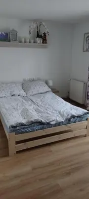 Łóżko lub łóżka w pokoju w obiekcie POD BZEM