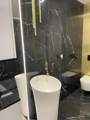 Łazienka w obiekcie Apartamenty Manhattan