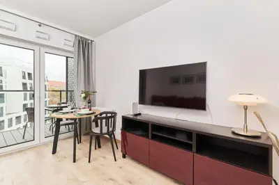 Telewizja i/lub zestaw kina domowego w obiekcie Studio Księcia Witolda 32 by Noclegi Renters