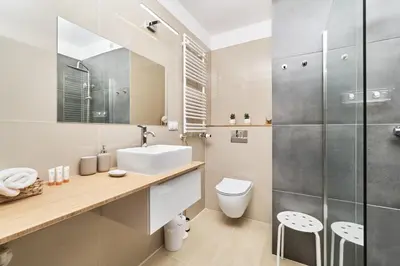 Łazienka w obiekcie Studio Księcia Witolda 32 by Noclegi Renters