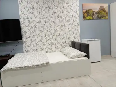 Łóżko lub łóżka w pokoju w obiekcie Róża- Lotnisko