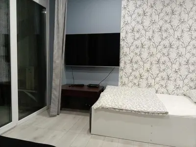 Łóżko lub łóżka w pokoju w obiekcie Róża- Lotnisko