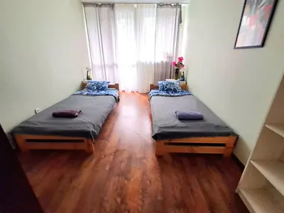 Łóżko lub łóżka w pokoju w obiekcie Jelenia