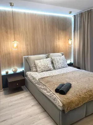 Łóżko lub łóżka w pokoju w obiekcie Gdanska Apartment