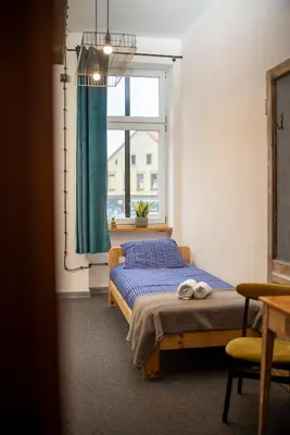 Łóżko lub łóżka w pokoju w obiekcie 5 Porte