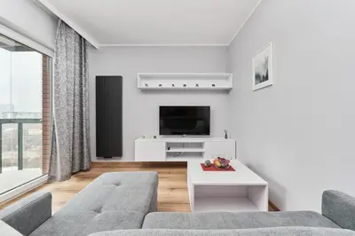 Telewizja i/lub zestaw kina domowego w obiekcie Browary Wrocławskie Modern Apartment by Noclegi Renters