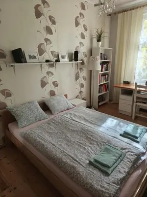Łóżko lub łóżka w pokoju w obiekcie Apartament Wyspa Piasek
