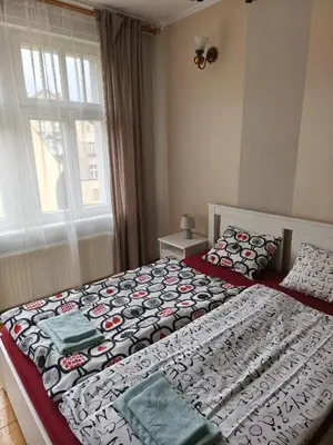 Łóżko lub łóżka w pokoju w obiekcie Apartament Wyspa Piasek