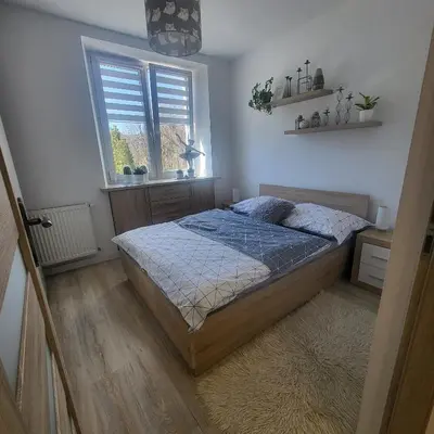 Łóżko lub łóżka w pokoju w obiekcie Apartament Twoja Chwila