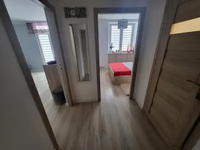 Łóżko lub łóżka w pokoju w obiekcie Apartament Twoja Chwila