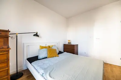 Łóżko lub łóżka w pokoju w obiekcie Krucza Apartment ~ Self check-in 24h ~ Parking and Lift