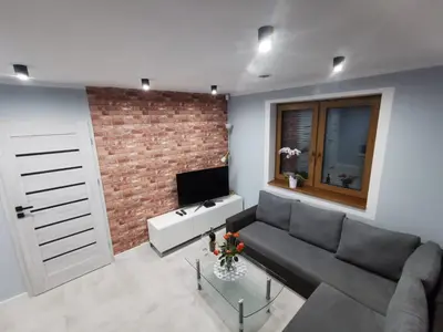 Telewizja i/lub zestaw kina domowego w obiekcie Na Jedwabnej