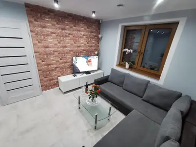 Telewizja i/lub zestaw kina domowego w obiekcie Na Jedwabnej