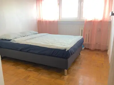 Łóżko lub łóżka w pokoju w obiekcie Stilo Dom - ul Nowowiejska